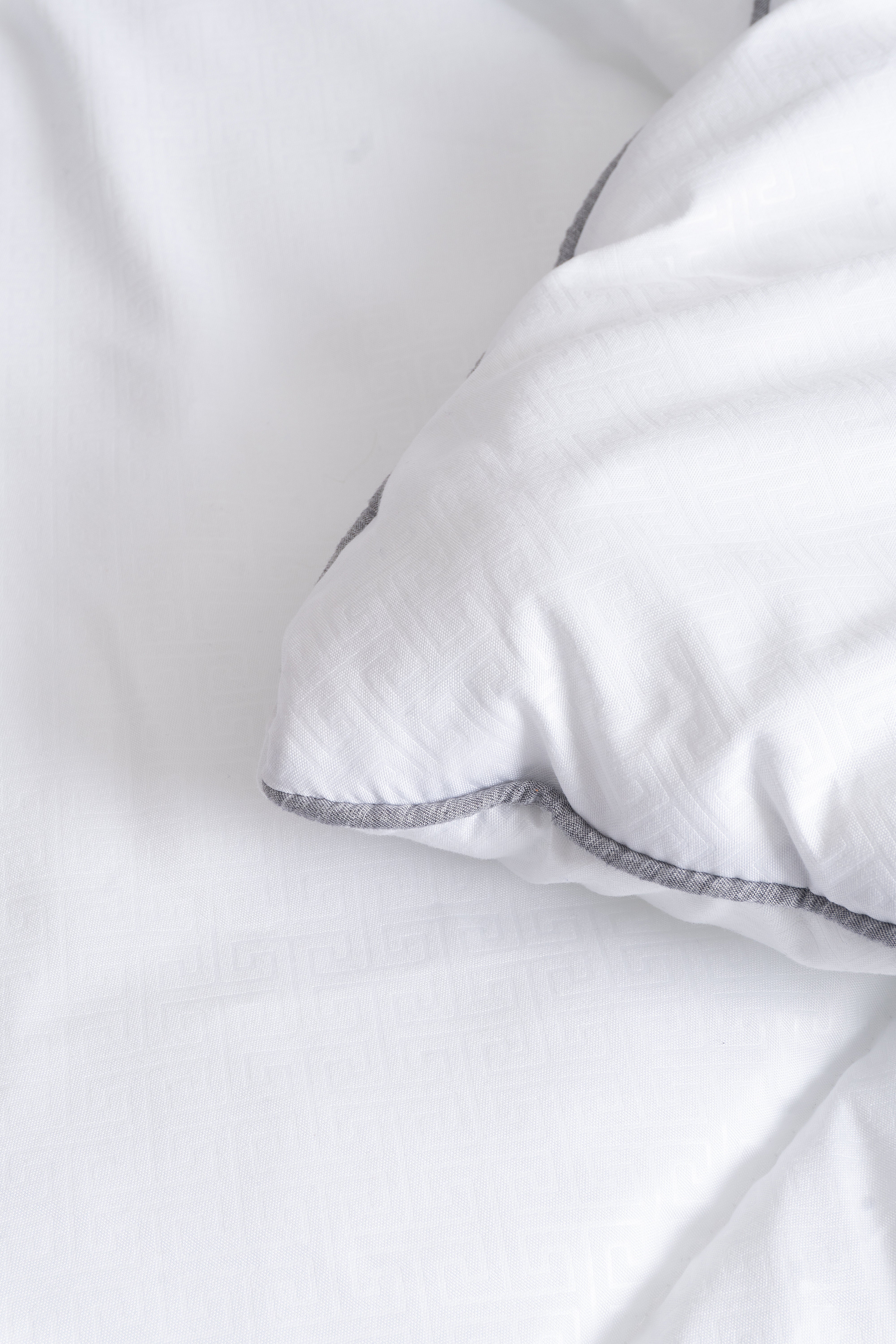 Cozy Montecarlo duvet insert with a soft, lightweight design and grid stitching to keep the eco-plum filling in place.