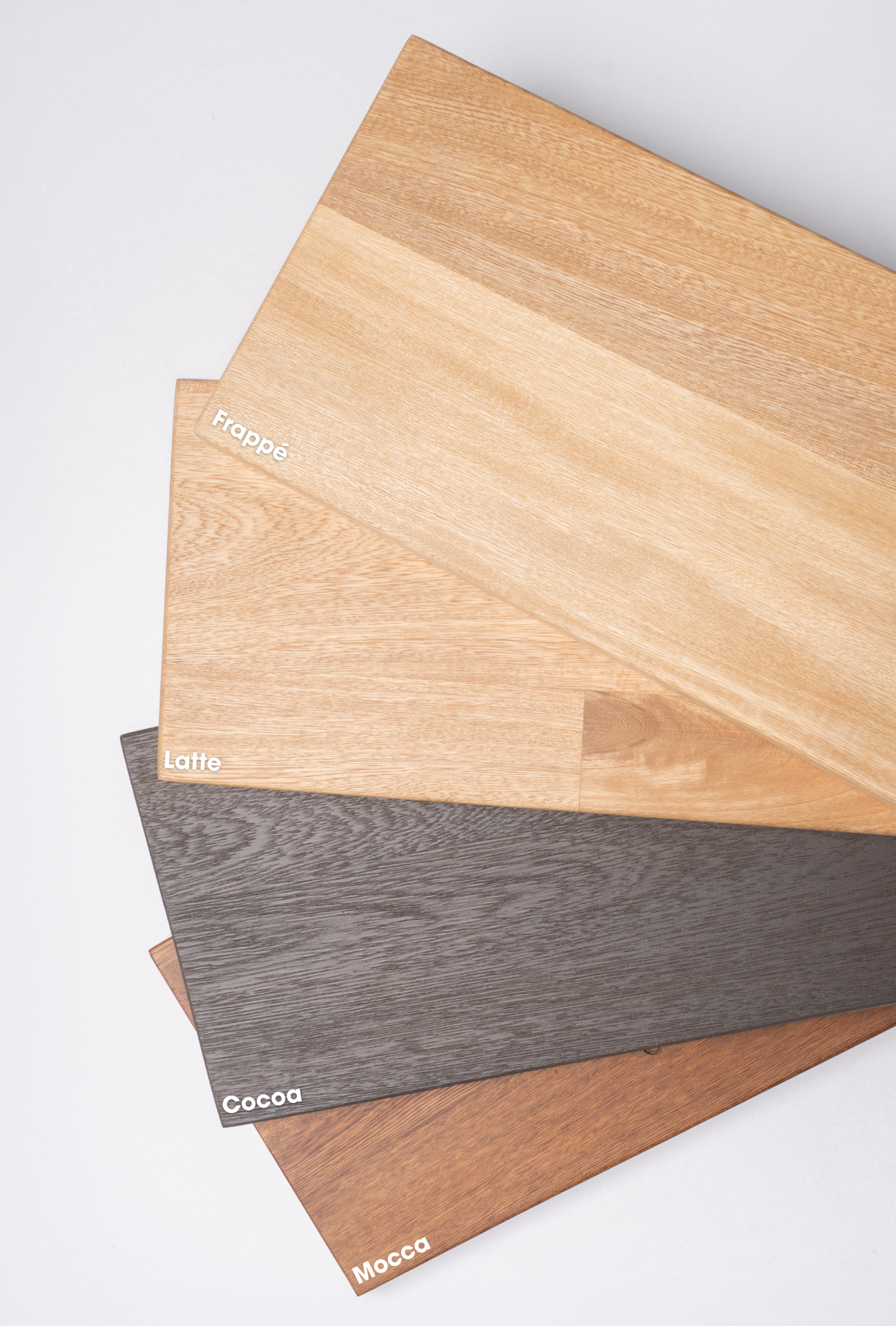 Elegant Mesa de Centro Nápoles with a contemporary design, featuring light-toned Flormorado wood and a matte gray steel frame.