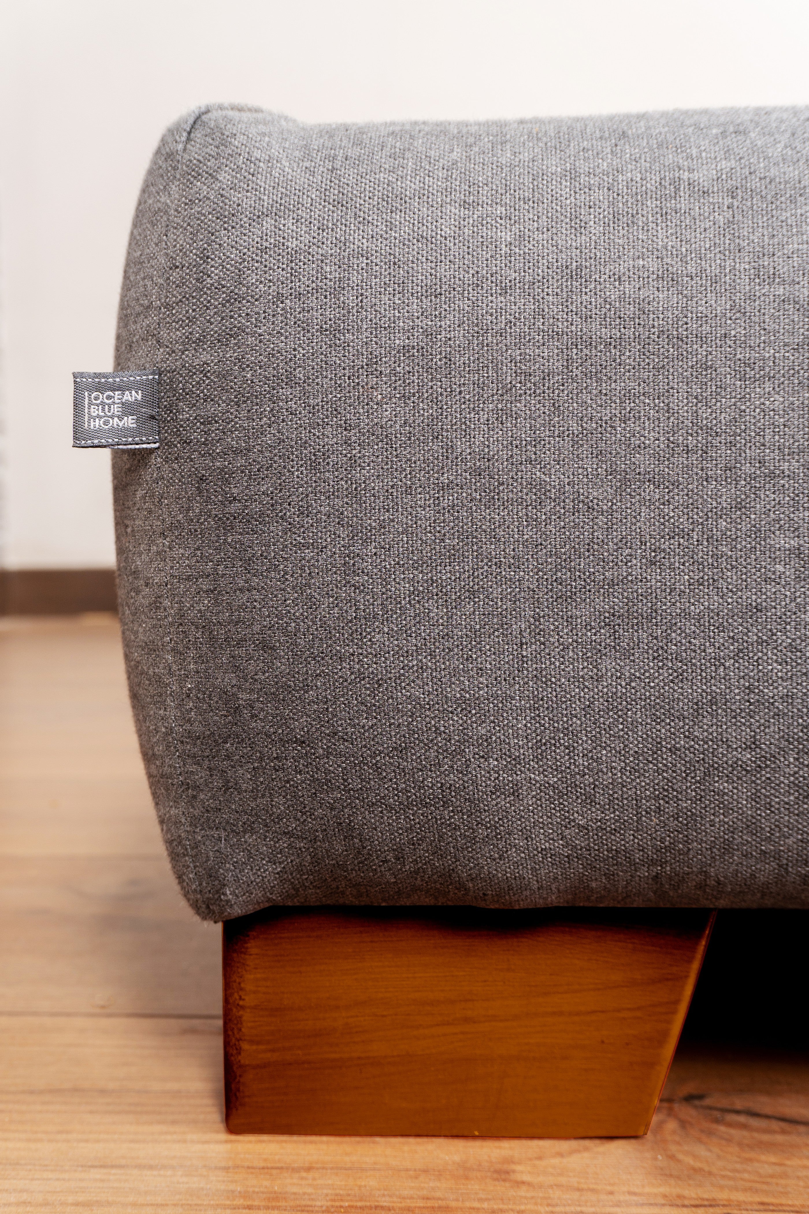 Elegant Base Cama Venecia with a sleek, lona-upholstered frame in neutral tones, perfect for a stylish bedroom setup.