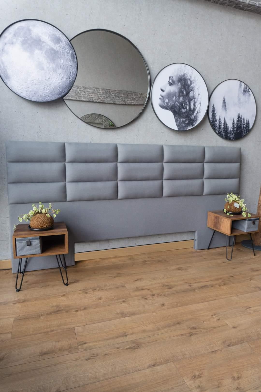Elegant Cabecero York headboard upholstered in canvas, featuring a contemporary design with side extensions for a cohesive bedroom look.