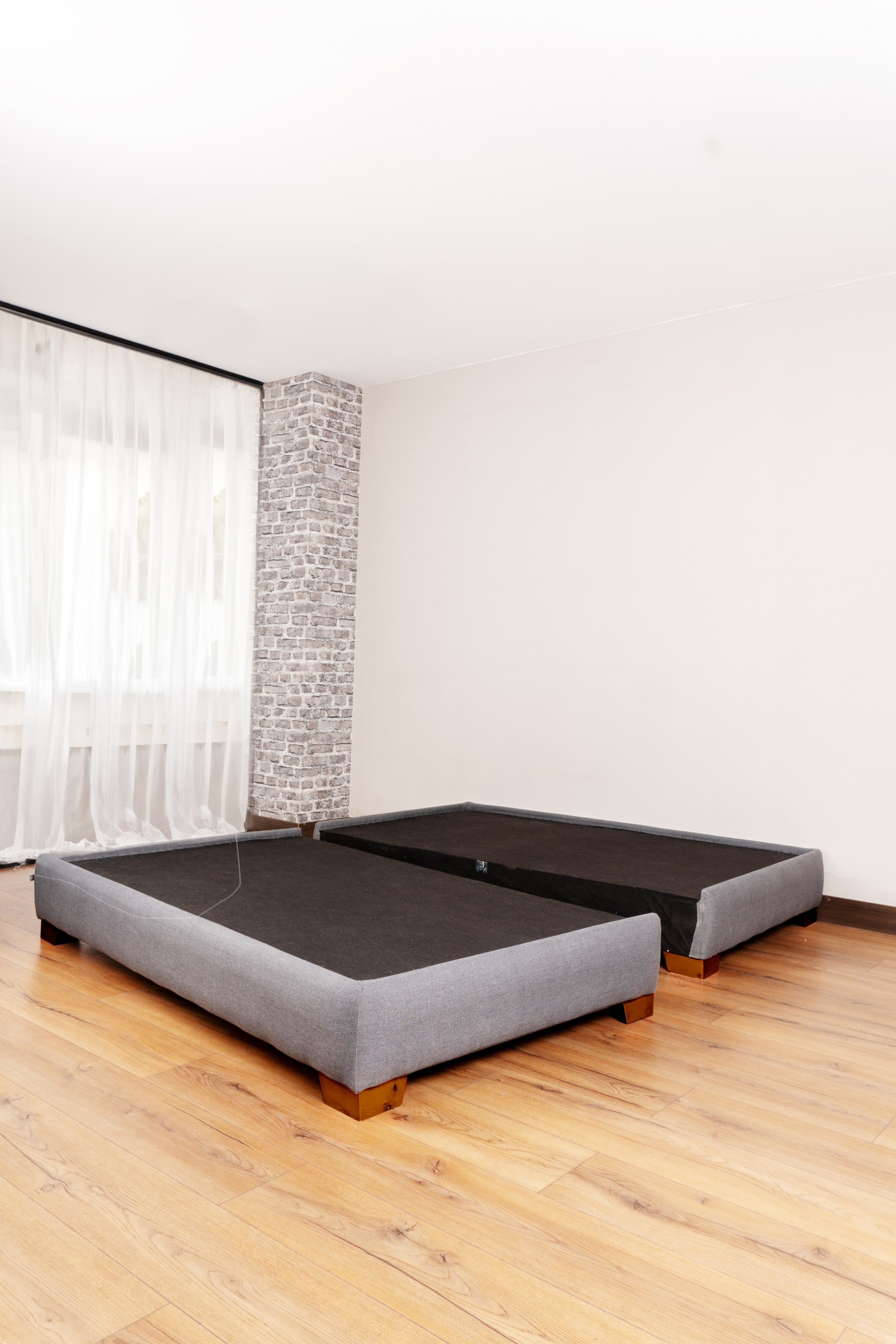 Elegant Venecia bed base with a stylish canvas upholstery in neutral tones, perfect for a chic and cozy bedroom setup.