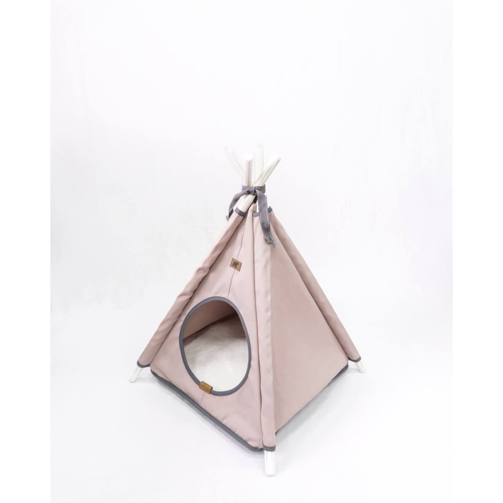 Cozy Teepe Pets Bongo Marsala tent for pets, featuring a stylish canvas design with wooden poles and a comfy foam base.